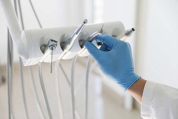 Professional Tooth Extraction technician working in Hamilton College, NY